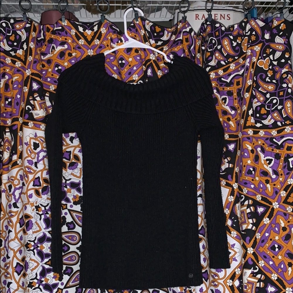 Long sleeve off the shoulder sweater.